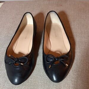 Stuart Weitzman Black Leather Ballet flats with bow.